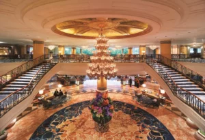 Shangri-La Manila Makati: an opulent hotel lobby with grand chandeliers and luxurious decor in Manila, Philippines.